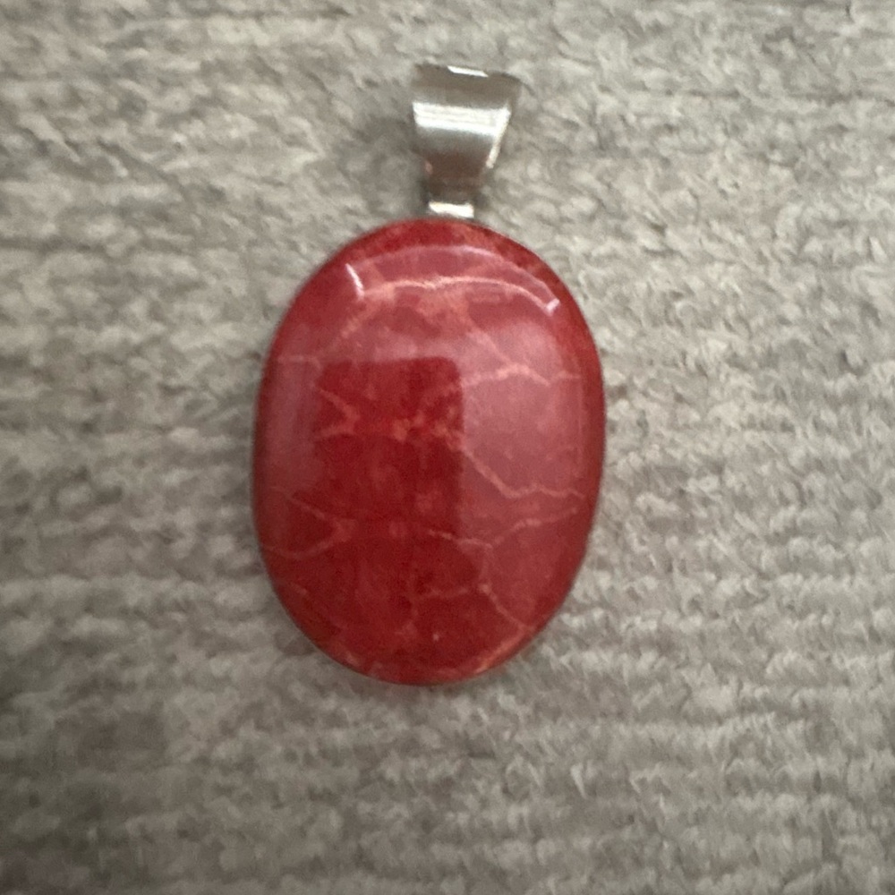 GUC stamped..925 pendant with stone